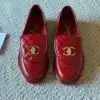 CHANEL Quilted Gold Turnlock Loafers in Burgundy
