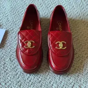 CHANEL Quilted Gold Turnlock Loafers in Burgundy