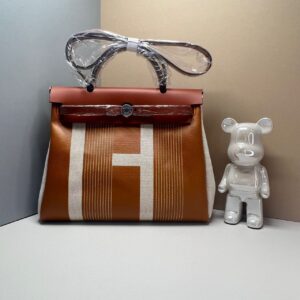 Design Herbag Zip 31 made of canvas in beige - Dubai Fashion LUX