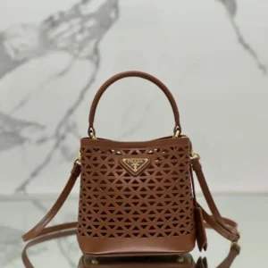 Design Panier leather mini-bag with cut-out motif - Dubai Fashion LUX