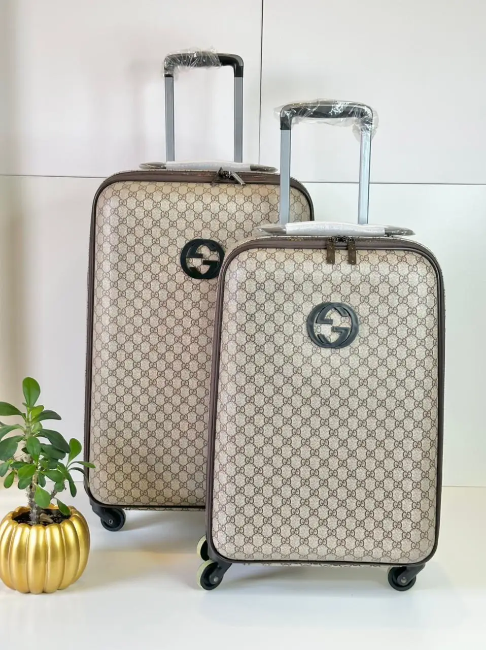 Gucci GG Supreme Rolling Luggage – Luxury Travel Bag with GG Canvas