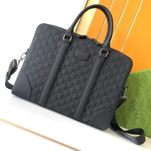 Gucci GG embossed leather laptop bag