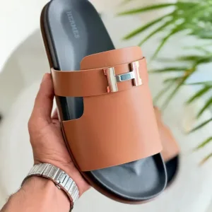 Hermès Arles leather slides